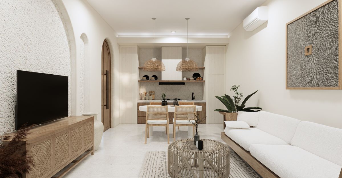 Cozy minimalist living room interior with dining area, modern decor, and natural elements in Bali villa.